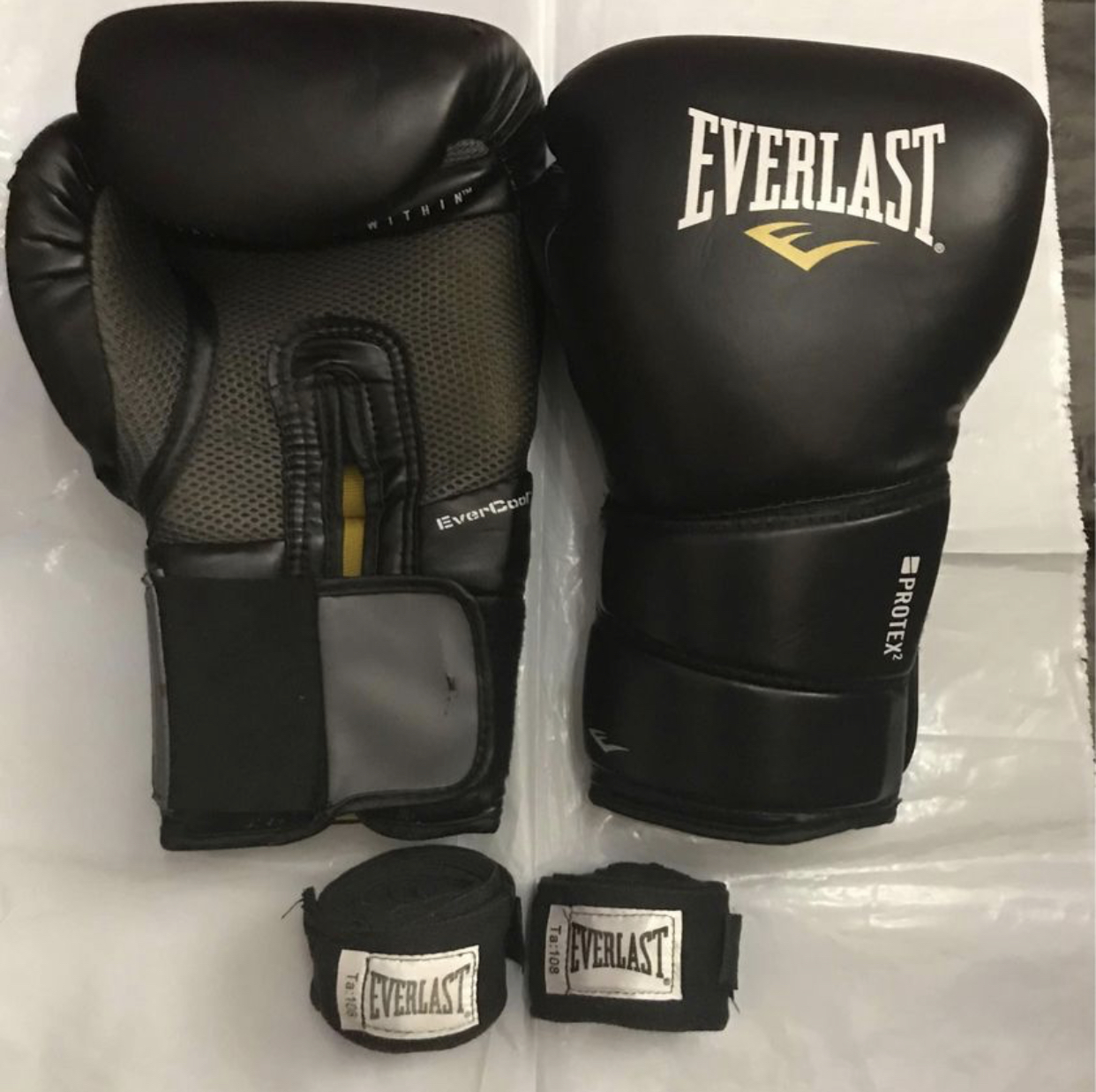 Everlast boxing gloves and hand wraps