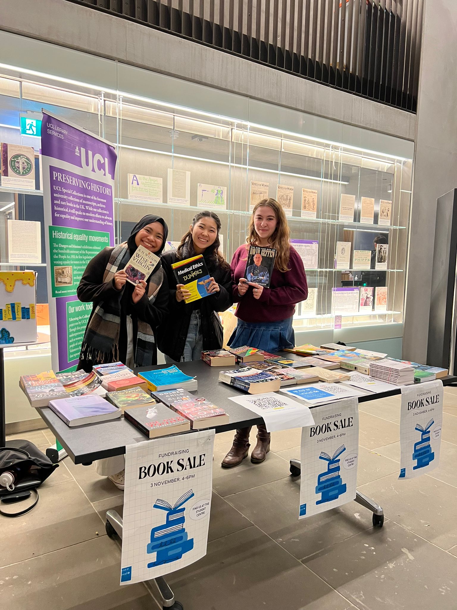 Volunteers at the book sale stand
