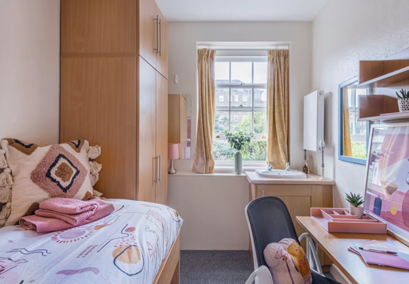 Room Interior. Single Bed with storage underneath.