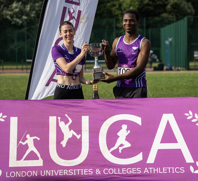 The 2024-25 UCL RAX president and athletics captain accept the final University of London Cup trophy together.