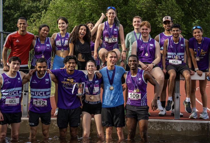 TheUCL RAX athletics team pose with the mixed medley trophy at the 2025 LUCA Outdoor Championships.