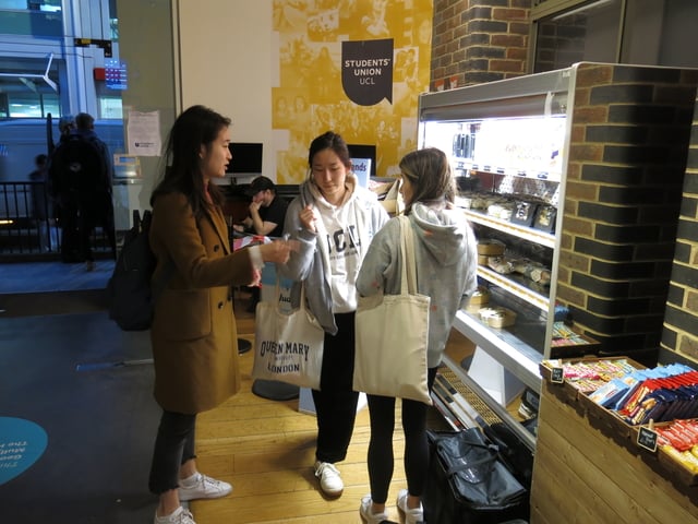 students picking up food from cafe